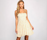 Robe fluide à fleurs tissées et dos nu